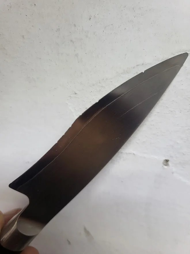 Chipped paring knife before repair